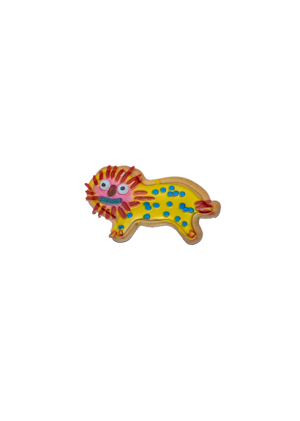 weird lion cookie magnet